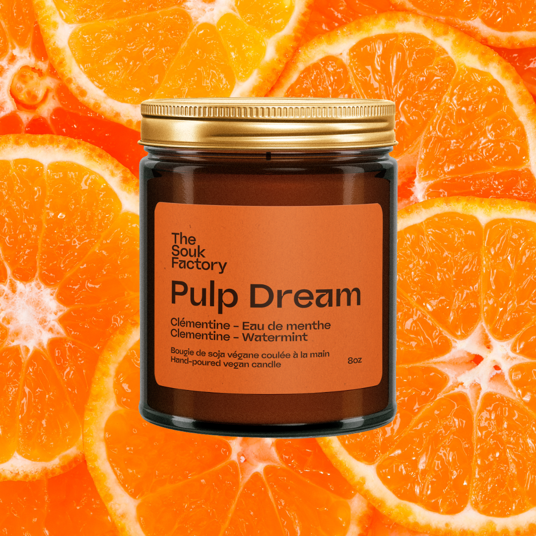 Bougie Pulp Dream 8 oz sur fond de clémentines coupées