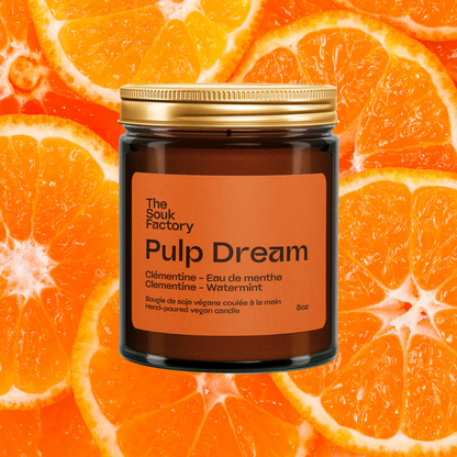 Bougie Pulp Dream 8 oz sur fond de clémentines coupées